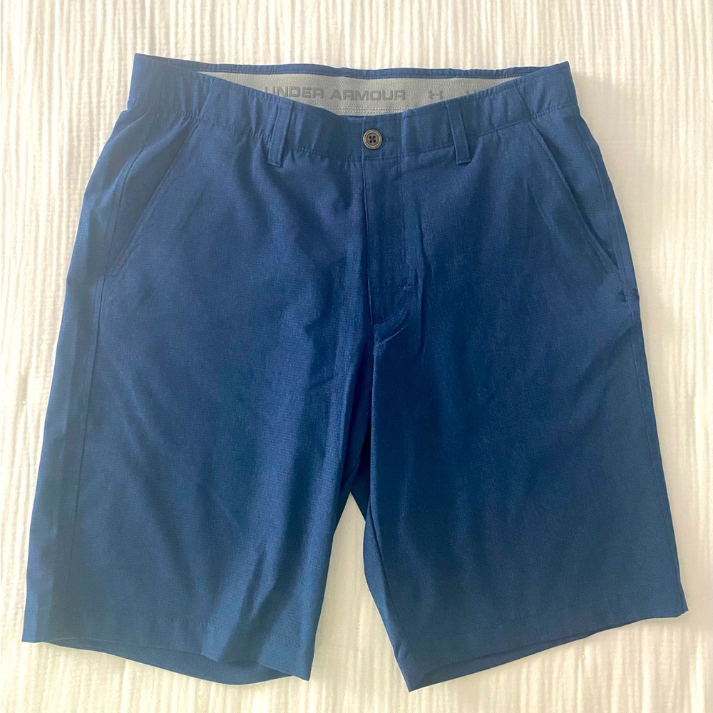 Under Armour men’s heat gear shorts.  Waist size 34.